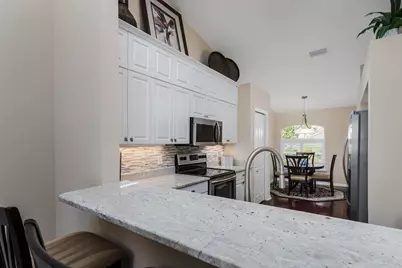 6658 Castlelawn Place, Naples, FL 34113 - Photo 10