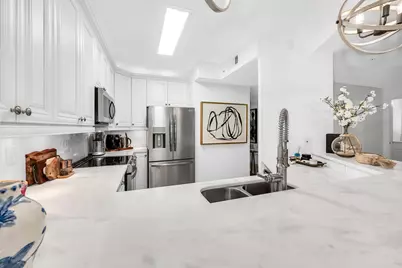 7671 Pebble Creek Circle #105, Naples, FL 34108 - Photo 12