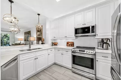 7671 Pebble Creek Circle #105, Naples, FL 34108 - Photo 2
