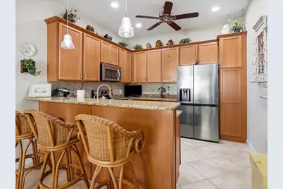 8647 Genova Court, Naples, FL 34114 - Photo 12