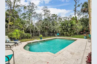 2446 Butterfly Palm Drive, Naples, FL 34119 - Photo 1