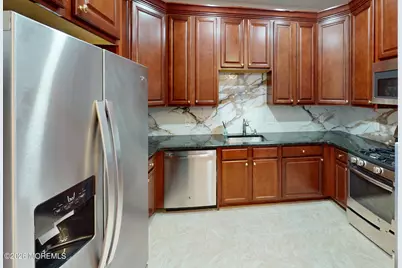 112 Regency Court, Morganville, NJ 07751 - Photo 2