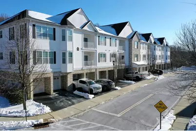 112 Regency Court, Morganville, NJ 07751 - Photo 1