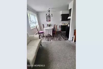 80 Manchester Court #E, Freehold, NJ 07728 - Photo 1