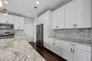 27 Goshawk Ct, Morganville, NJ 07751 - Photo 32