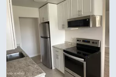 60 Manchester Court #E, Freehold, NJ 07728 - Photo 2