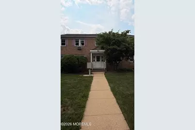 80 Manchester Court #E, Freehold, NJ 07728 - Photo 1