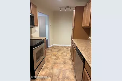 97 Arrowood Road #D, Manalapan Township, NJ 07726 - Photo 1