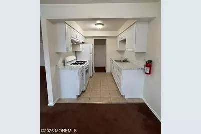 64 Stonehurst Boulevard #E, Freehold, NJ 07728 - Photo 1