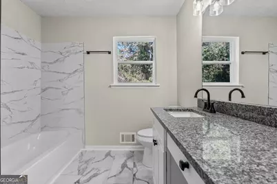 1444 Meadowind Court SW, Conyers, GA 30094 - Photo 6