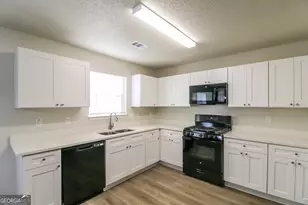 7010 New Dale Rd, Rex, GA 30273 - Photo 6