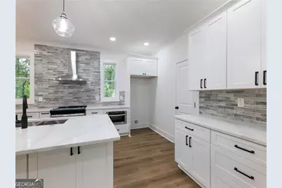 2438 Shadburn Ferry Drive, Buford, GA 30518 - Photo 12