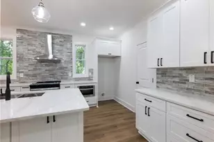 2438 Shadburn Ferry Dr, Buford, GA 30518 - Photo 12