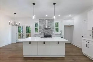 2438 Shadburn Ferry Dr, Buford, GA 30518 - Photo 8