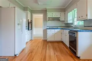 4722 Kenneth Dr SW, Lilburn, GA 30047 - Photo 6