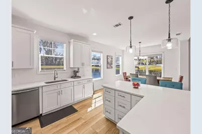 1038 Captain's Cove Way, Saint Simons, GA 31522 - Photo 18