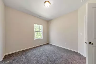 265 Birchwood Row, Holly Springs, GA 30115 - Photo 30
