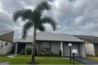 9801 Maplecrest Circle, Lehigh Acres, FL 33936 - Photo 1