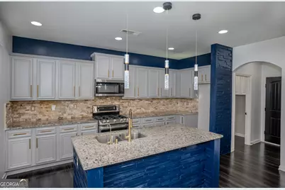 1527 Washington Rose Avenue, Hoschton, GA 30548 - Photo 18