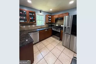4855 Indian Crest Court NW, Lilburn, GA 30047 - Photo 4