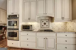 9485 Nesbit Lakes Dr, Alpharetta, GA 30022 - Photo 14