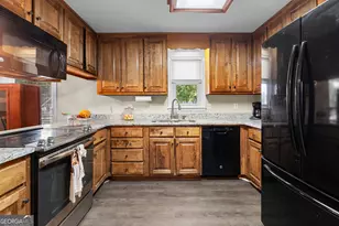 55 Manor Cir, Sharpsburg, GA 30277 - Photo 8
