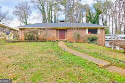 562 Dickens Road NW, Lilburn, GA 30047 - Photo 1