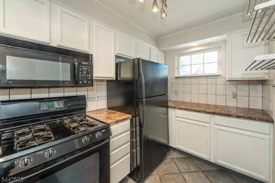 31 Victory Ct, Victory Gardens, NJ 07801 - Photo 12