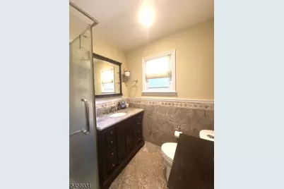 9 Carteret Rd, Livingston, NJ 07039 - Photo 4