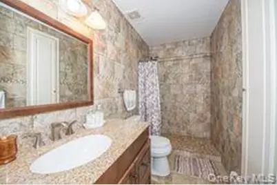 63 E Tiana Road, Hampton Bays, NY 11946 - Photo 22