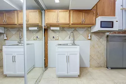 90-10 69th Avenue, Forest Hills, NY 11375 - Photo 30