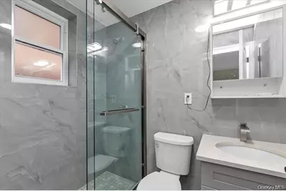 27-09 Utopia Parkway, Flushing, NY 11358 - Photo 10