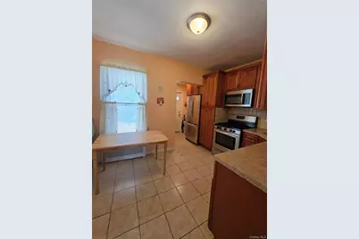 84-11 Sutter Avenue, Ozone Park, NY 11417 - Photo 2