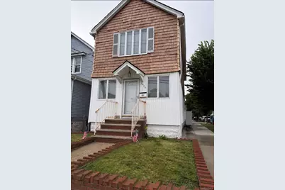 94-19 Pitkin Avenue, Ozone Park, NY 11417 - Photo 1