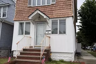 94-19 Pitkin Ave, Ozone Park, NY 11417 - Photo 1
