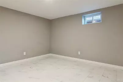 112 Woods Avenue, Roosevelt, NY 11575 - Photo 24