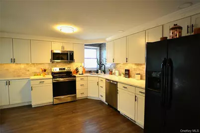 105 W Village Circle #105, Manorville, NY 11949 - Photo 6