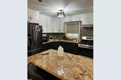 10144 98th Street, Ozone Park, NY 11416 - Photo 1