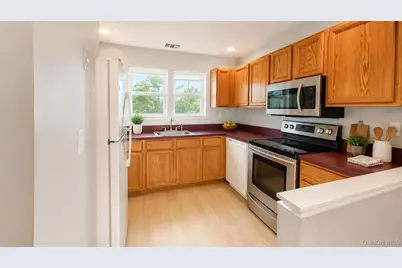 53 Village Circle E #E053, Manorville, NY 11949 - Photo 2