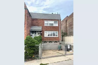 10343 Woodhaven Boulevard, Ozone Park, NY 11417 - Photo 1