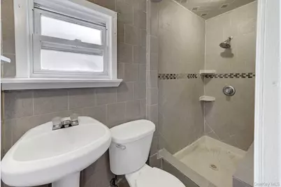 104 E Pennywood Avenue, Roosevelt, NY 11575 - Photo 12