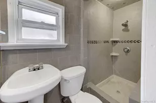 104 E Pennywood Ave, Roosevelt, NY 11575 - Photo 12