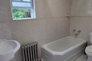42-21 65th Pl, Woodside, NY 11377 - Photo 6