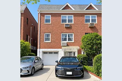 8427 Corona Avenue, Elmhurst, NY 11373 - Photo 1