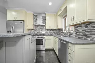 209-11 85th Ave, Hollis, NY 11427 - Photo 8