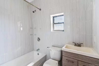 100-15 34th Avenue, Corona, NY 11368 - Photo 8