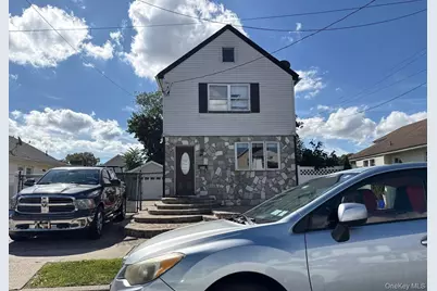 104 E Pennywood Avenue, Roosevelt, NY 11575 - Photo 1