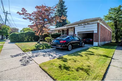 56-48 E. Hampton Boulevard, Oakland Gardens, NY 11364 - Photo 1