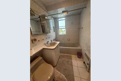 9515 Pitkin Avenue, Ozone Park, NY 11417 - Photo 10