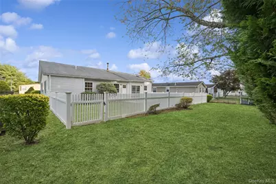 99 Village Circle W, Manorville, NY 11949 - Photo 18